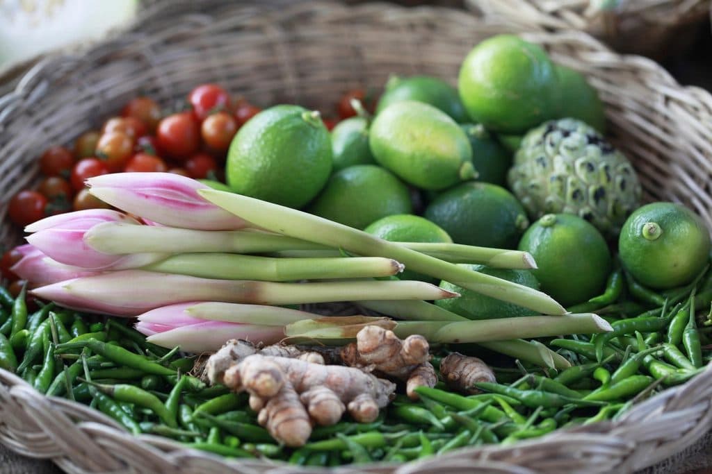 Basket of fresh organic vegetables, chillies and ginger